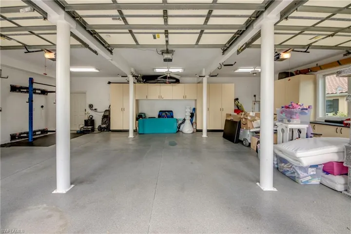 3 Car Garage w/Built-Ins & Work Space