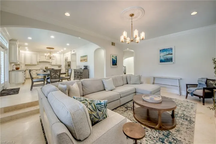 Perfect Flow from Expansive Kitchen & Dining Area to Stunning Step-Down Great Room
