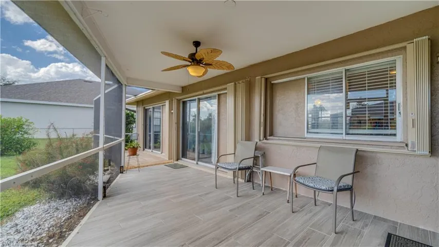 Screened lanai featuring ceiling fan