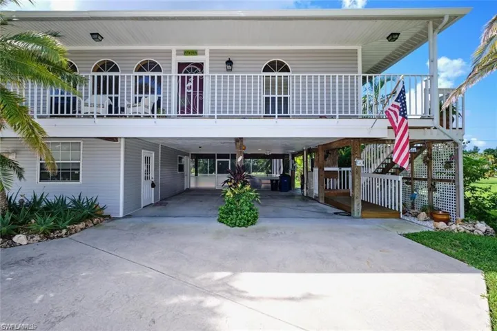 View of front of home featuring a carport