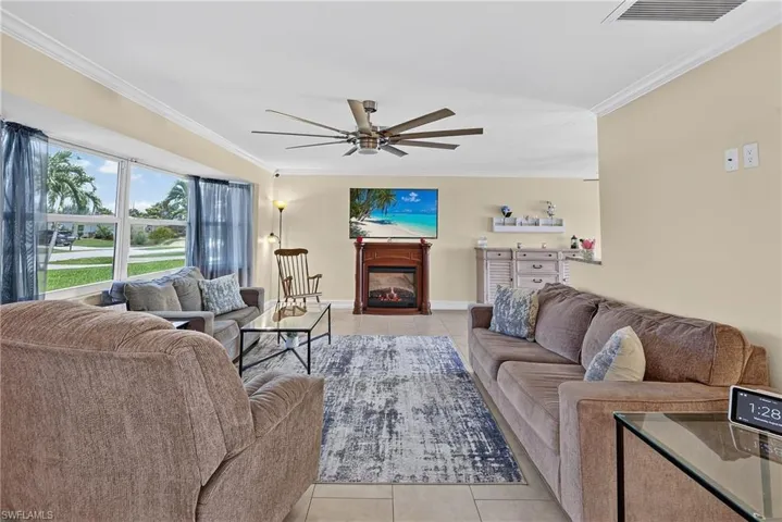 Recessed lighting and ceiling fan with multiple blades