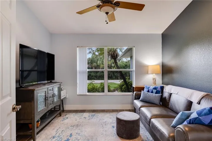 Den area being used as a TV room.