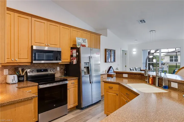 view of kitchen into the dining area.