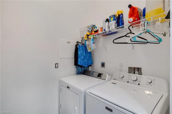 Laundry room with closet. Washer and dryer included.