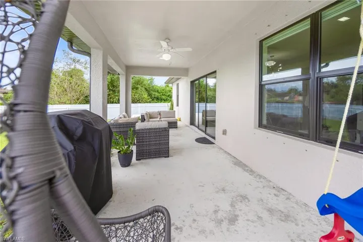 View of patio / terrace featuring an outdoor hangout area, a ceiling fan, and a grill