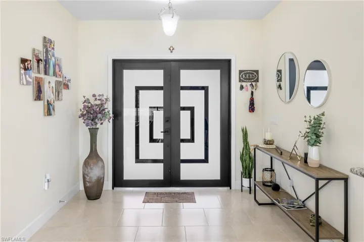 Foyer with tile patterned floors