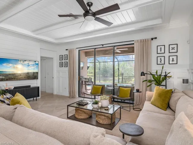 Tiled living room with ceiling fan