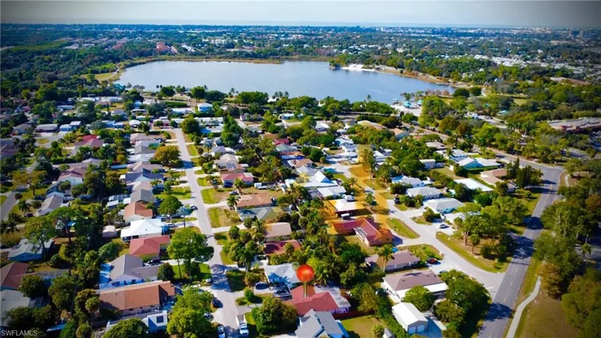 Aerial view of residential area with a large body of water