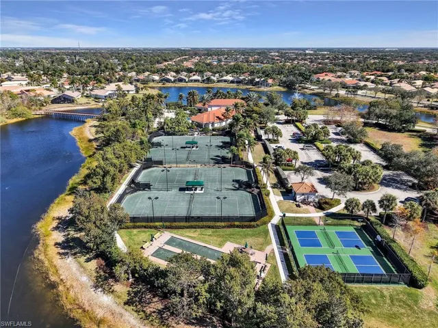 View of property location with nearby suburban area and a nearby body of water