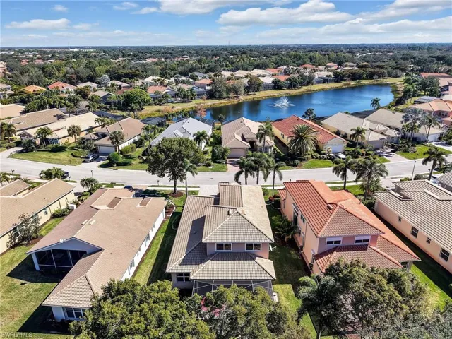 Aerial view of residential area with a nearby body of water