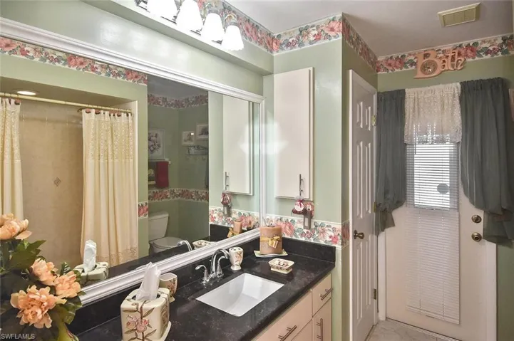...and a door to the lanai, or perhaps your future pool?