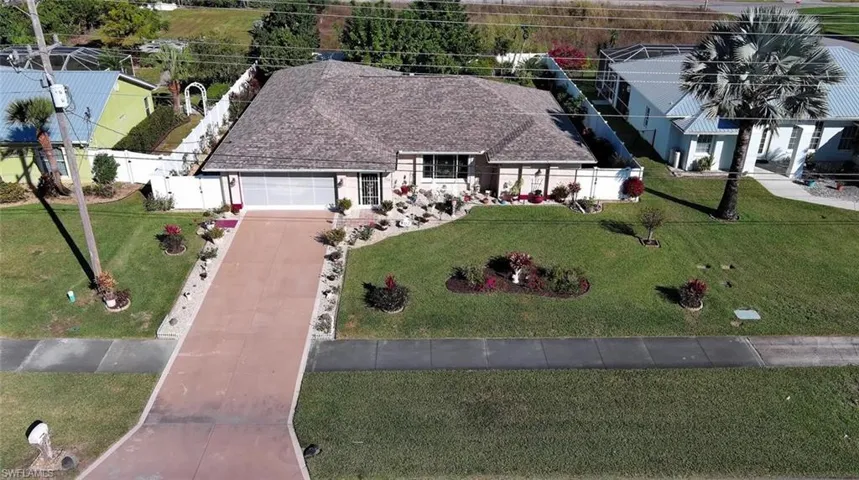Aerial view of property and the sidewalk through the neighborhood, great for an after-dinner stroll....