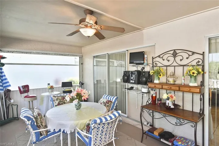 Far end of the lanai; sliders at right lead from the owners suite.
