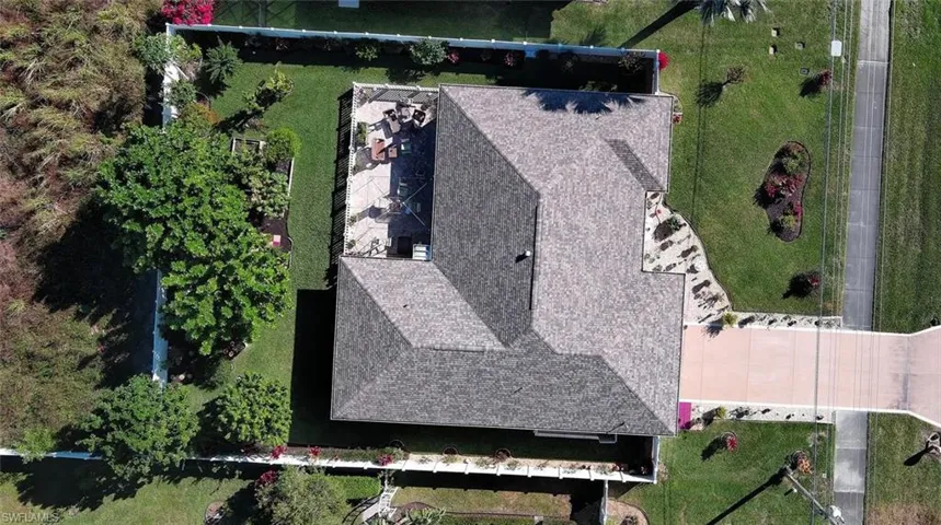Aerial view of property showing the dimensional shingle roof...