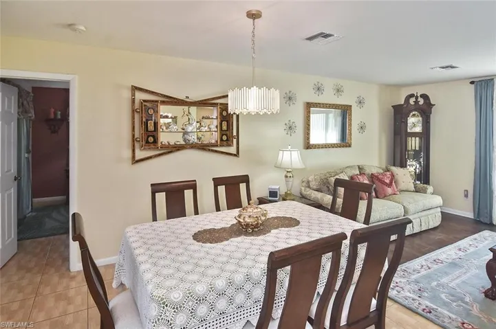 Dining area with door to the owner's suite beyond.