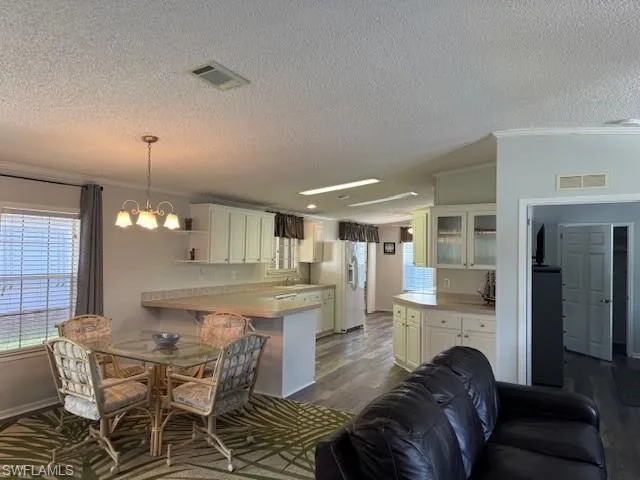 open floor plan , dining and living area