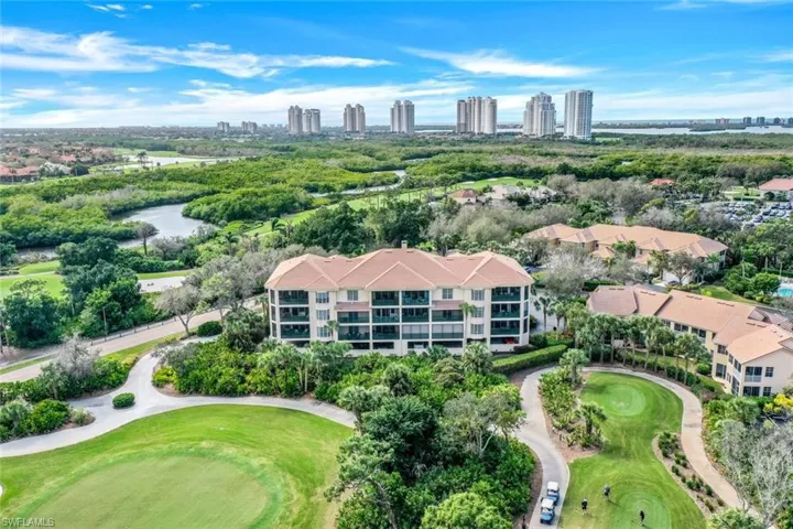 Rear views facing west to show the high rises along Estero Bay and the Gulf of Mexico