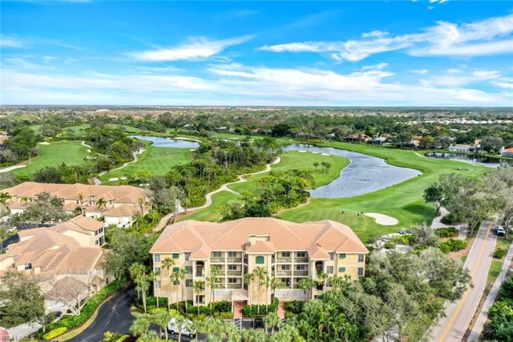 Birds eye view of property featuring two lakes and 2 fairways lovely and serene views