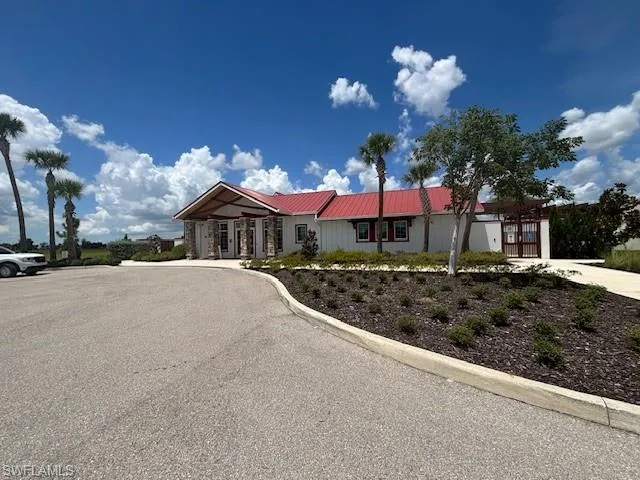 Ranch-style home with a metal roof