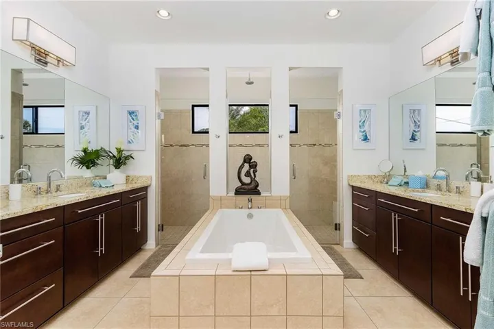 Primary Bathroom w/ Walk-in Shower and soaking tub