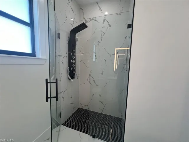 Bathroom featuring walk in shower