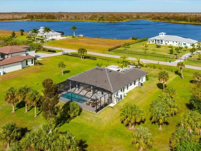 View of subject property featuring a large body of water