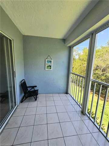 Beautiful private screened balcony hurricane shutters