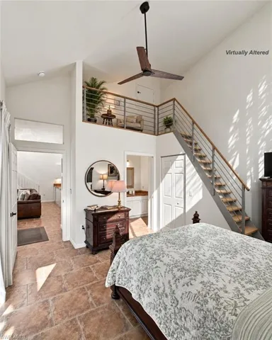 CONCEPTUAL RENDERING ONLY: Photo digitally altered to illustrate potential addition of a loft and staircase in master bedroom. No representation is made as to the feasibility, permitting, structural requirements, cost, or association approval of such modification for this unit. Buyer to conduct their own due diligence.