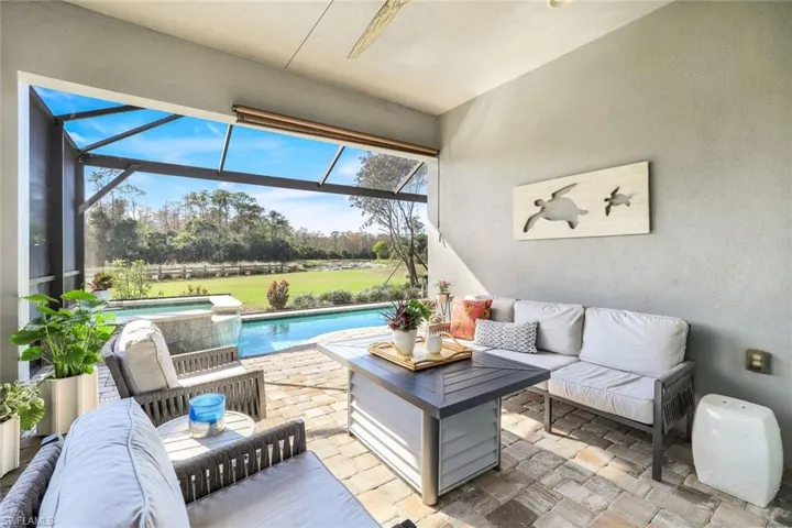 View of patio / terrace with an outdoor living space and a lanai