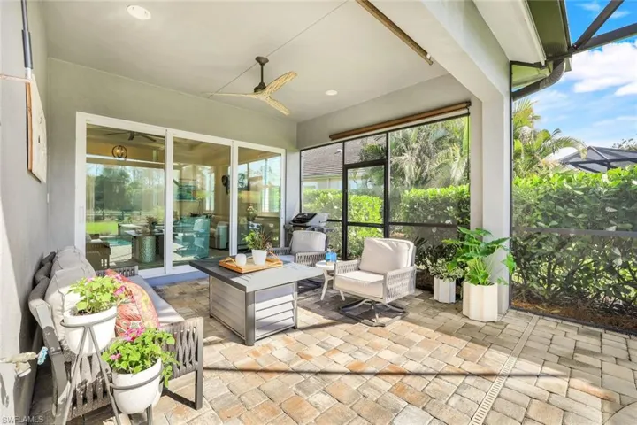Sunroom / solarium with plenty of natural light and ceiling fan