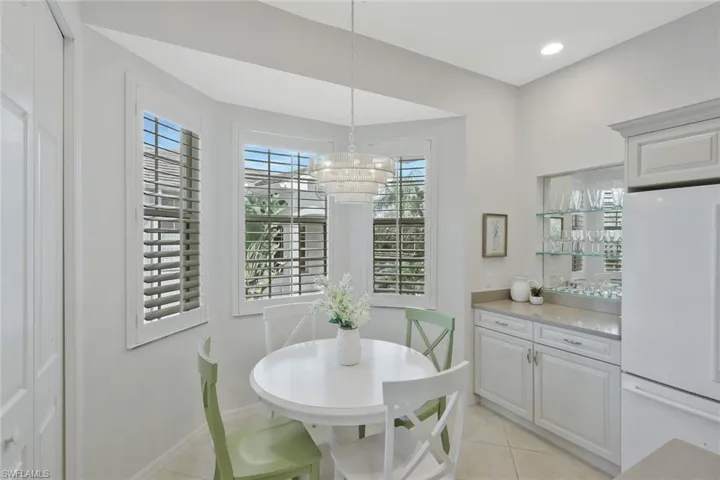 Bright kitchen with a comfortable eat in dining area, perfect for casual meals and gathering with family or guests.