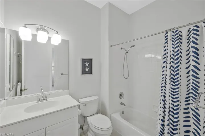 Updated guest bathroom with stylish finishes designed for comfort and convenience.
