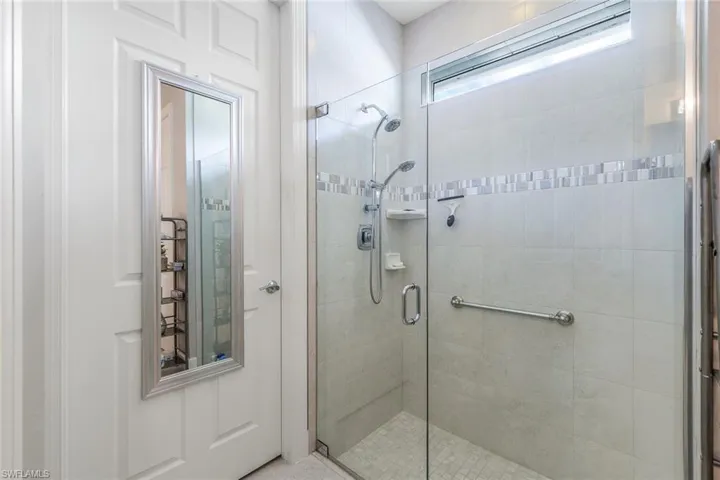 Bathroom featuring walk in shower