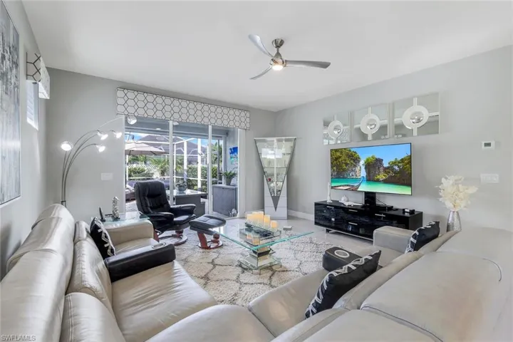 Tiled living room with ceiling fan