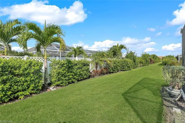 View of yard featuring a lanai