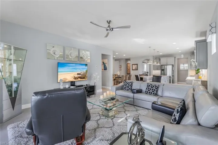 Tiled living room with ceiling fan