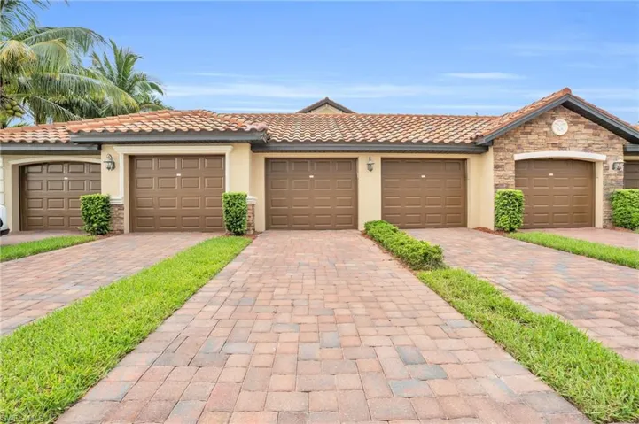 View of front of property with a garage