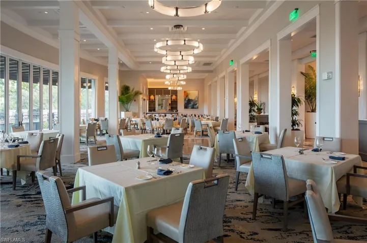 Dining area with beamed ceiling and a chandelier