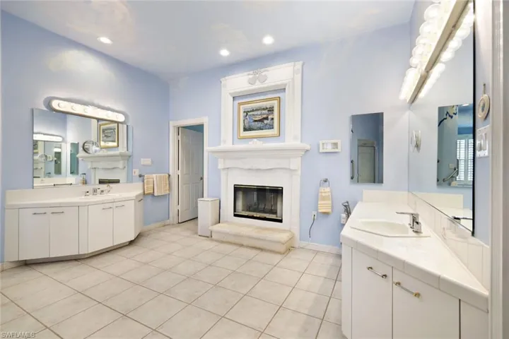 Bathroom with vanity and tile patterned floors