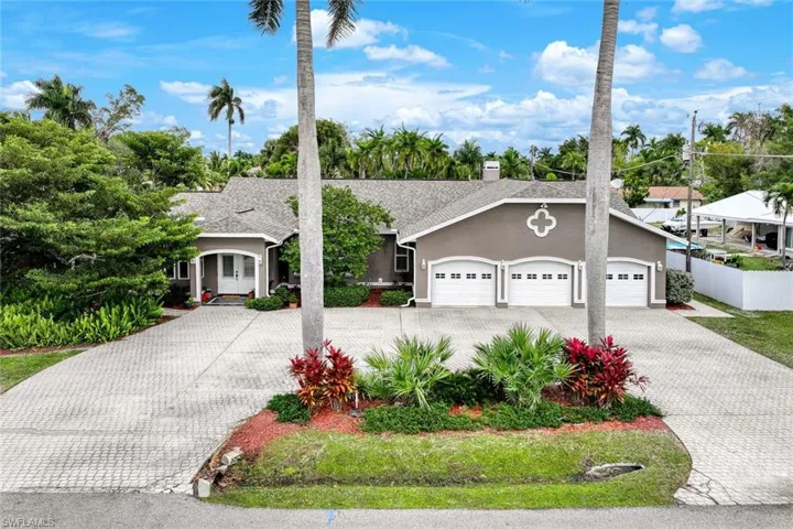 Ranch-style home featuring a garage