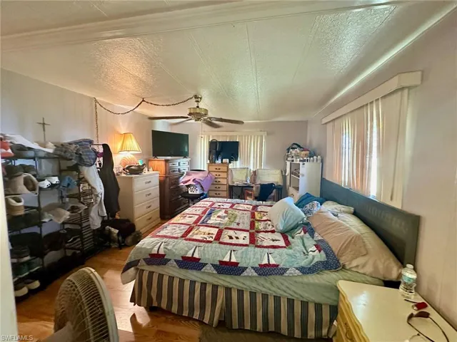 Spacious primary bedroom easily accommodates a King-size bed