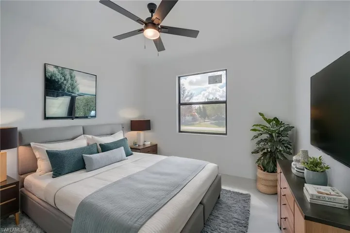 Bedroom featuring a ceiling fan