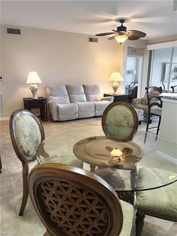 Living room featuring a ceiling fan