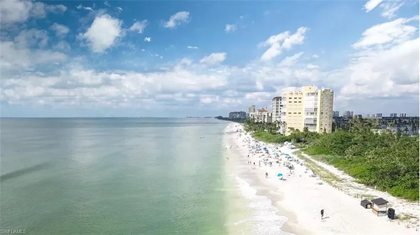 Water view featuring nearby beach and nearby urban area
