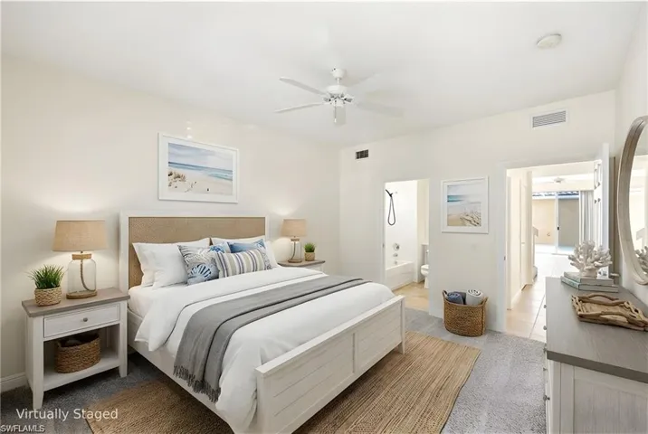 Virtually staged Bedroom on first Floor with own entry and access to an outdoor patio.