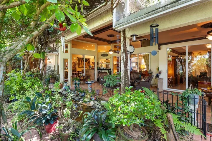 View of patio featuring ceiling fan