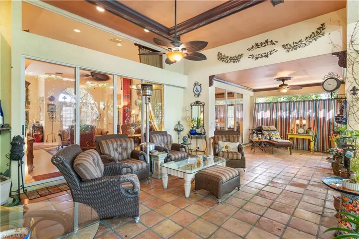 View of patio featuring ceiling fan and an outdoor hangout area