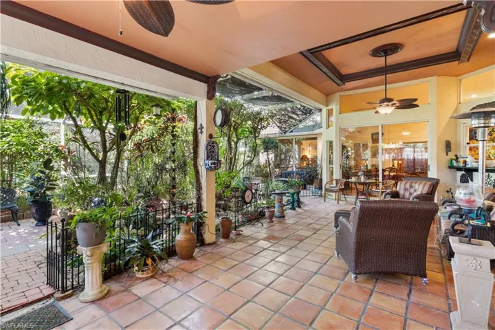 View of patio featuring outdoor lounge area and ceiling fan