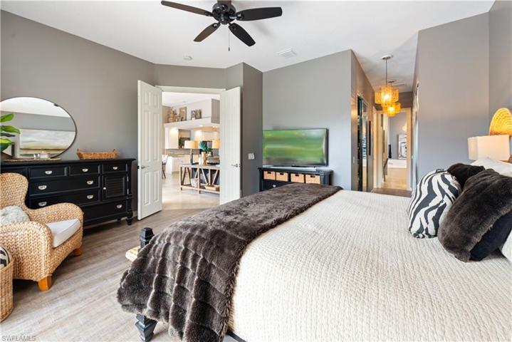 The Master Bedroom Has Two Solid French Wooden 8 Foot Entry Doors, A Private Double Glass Slider Out To The Pool/Lanai Area, Two Master Bathrooms, And Three Walk-In Closets!