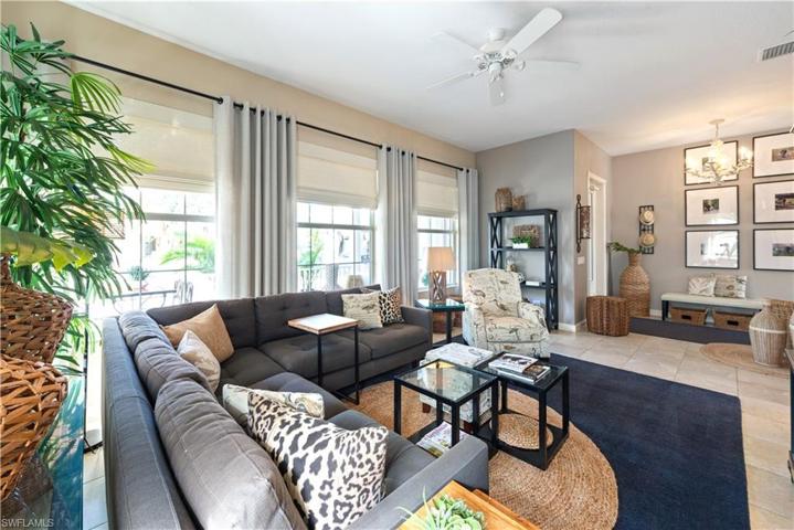 The Formal Living Room Has Plenty Of Windows And Natural Light! Tastefully Furnished And Ready To Entertain!